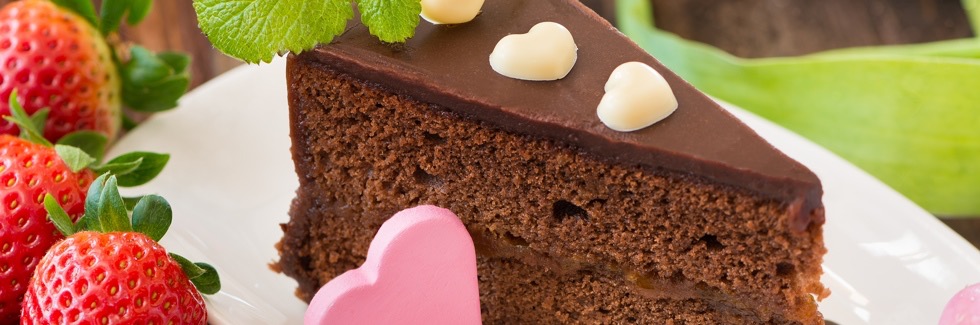 House-made chocolate cake with fresh strawberries